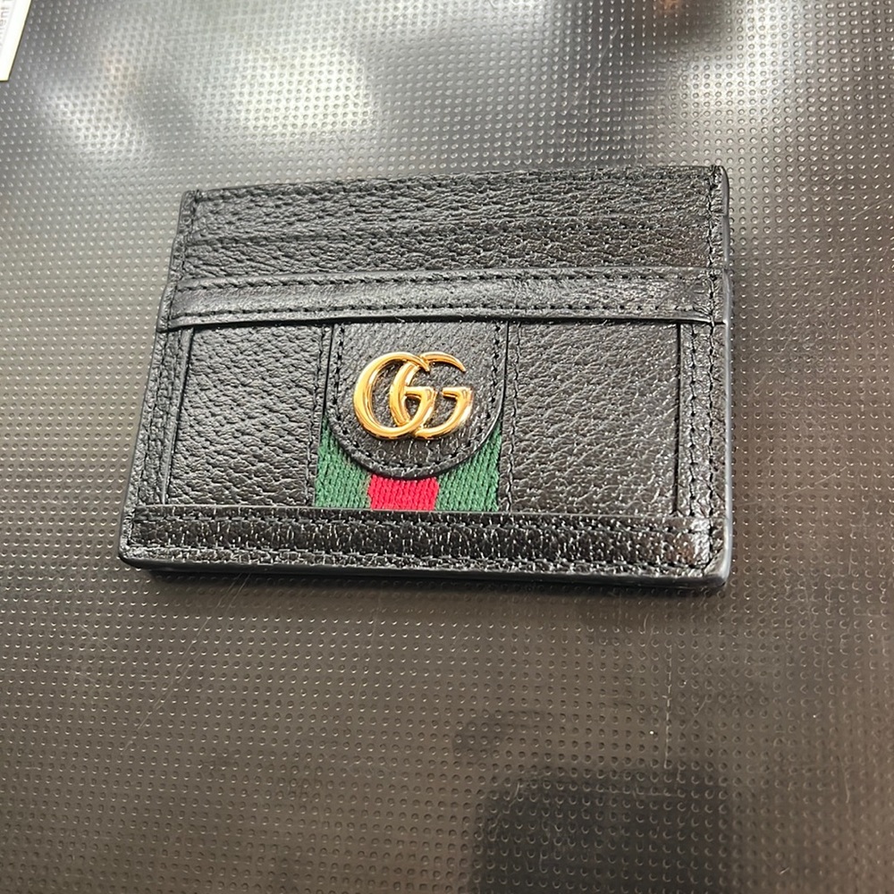 Black Gucci credit card holder